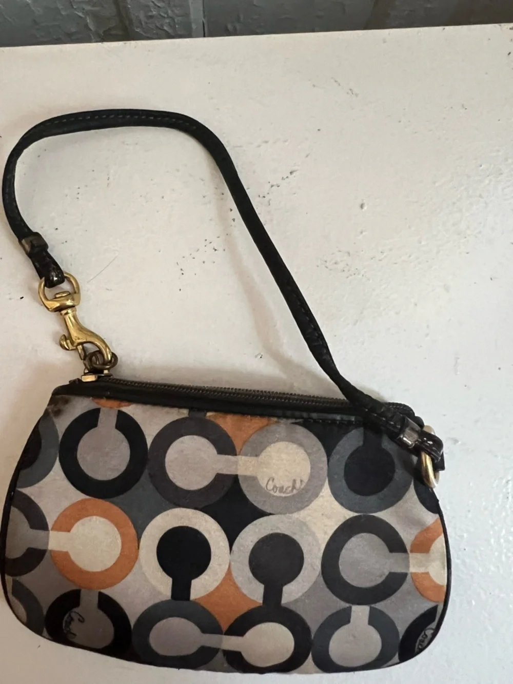 Coach Small Signature Circle Print Wristlet in Black, Tan and Gray